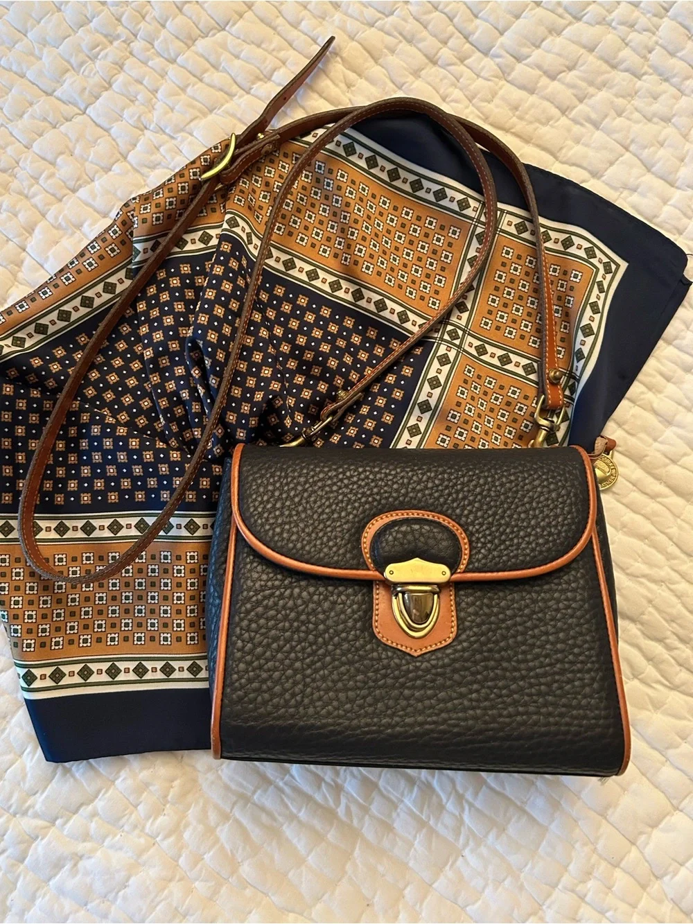 Structured Navy Dooney&Bourke Crossbody Bag with Tan Trim and Gold Accent